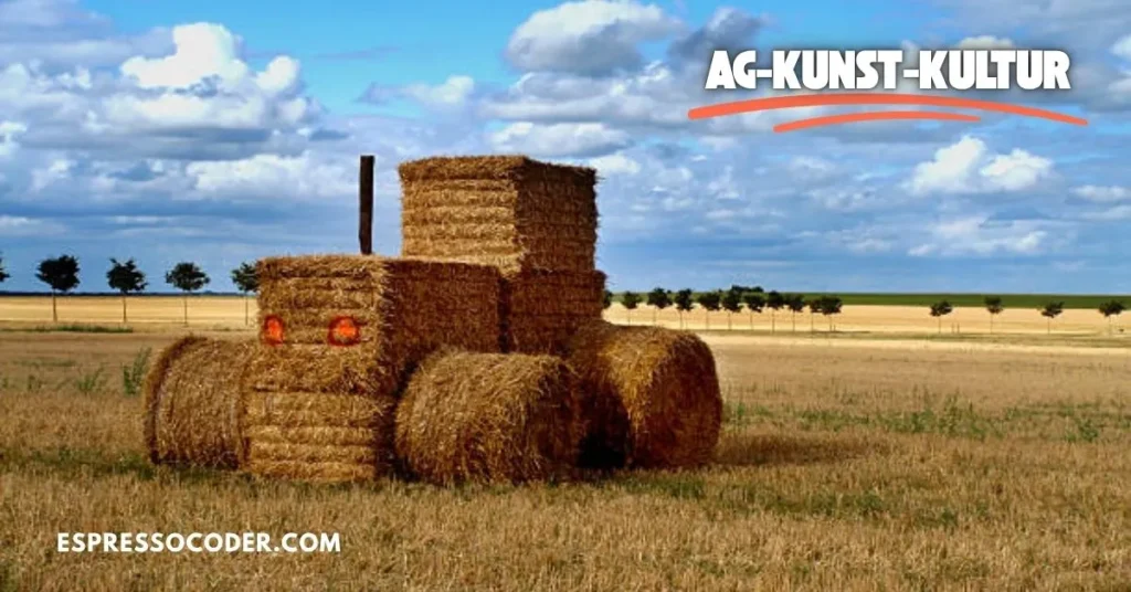 Hay bale land art sculpture in wheat field representing Ag-Kunst-Kultur creativity.