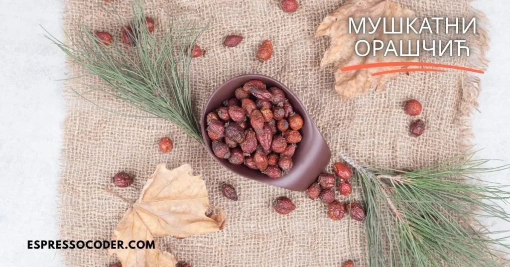 Whole мушкатни орашчић seeds and mace drying on a bamboo tray under sunlight.