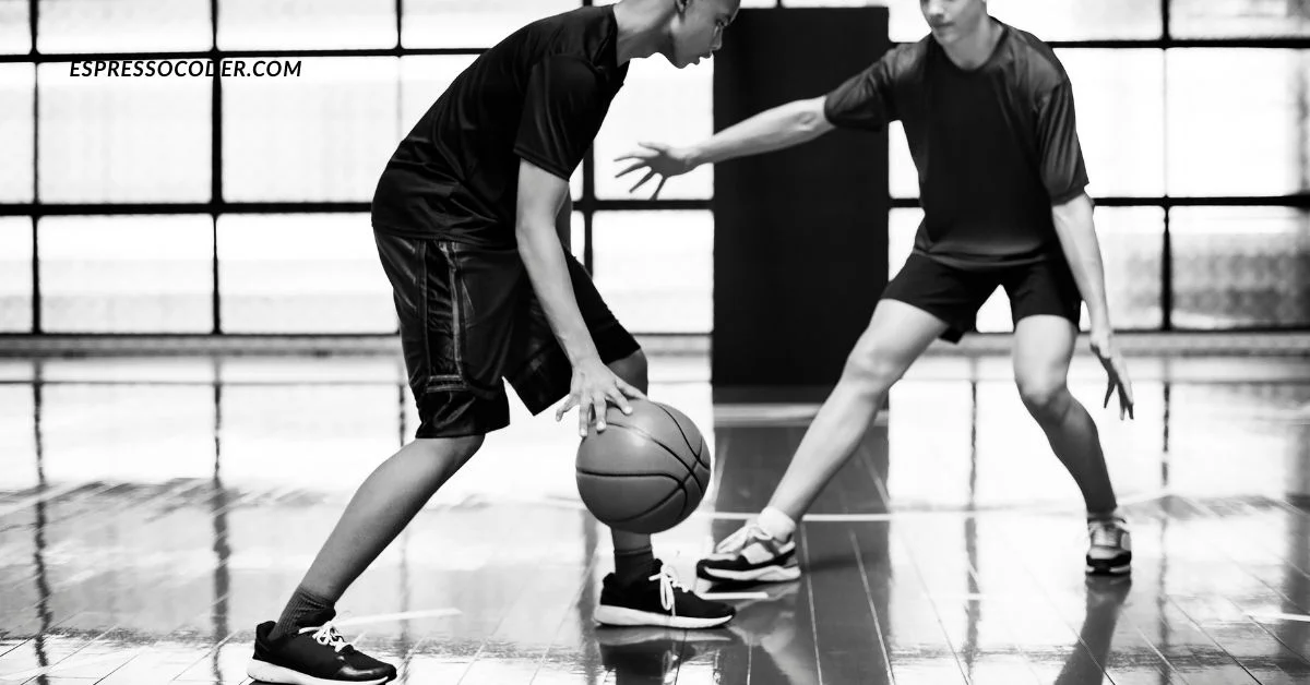 Basketball players demonstrating spacing in Zuyomernon System offense.