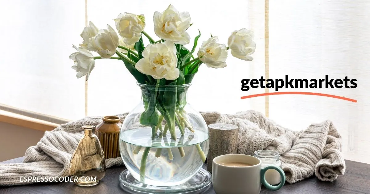 Elegant white rose centerpiece on modern dining table.
